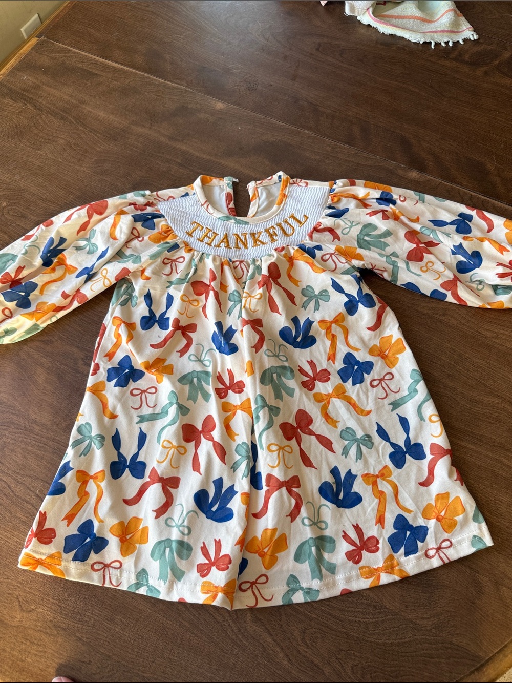 Smocked 'THANKFUL' Bow Print Long-Sleeve Baby Dress
